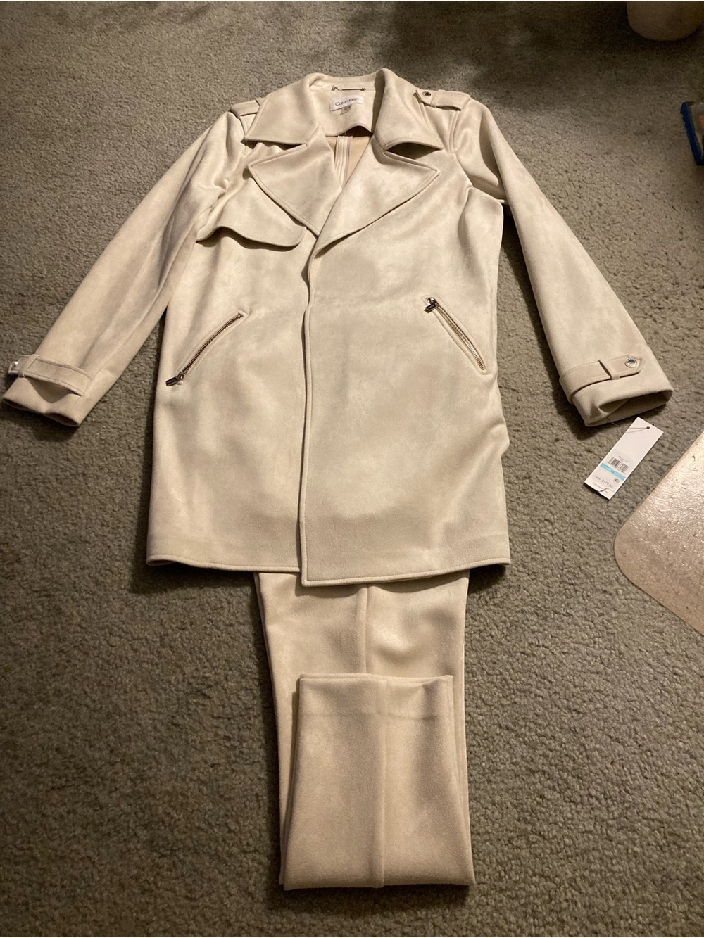 Woman’s suede like jacket with matching pantsuit CalvinKlein